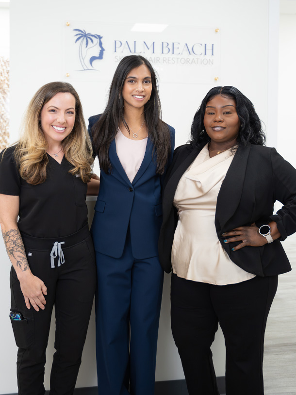 Dr. Leena Ramani with her staff at Palm Beach Skin & Hair Restoration in Jupiter, FL