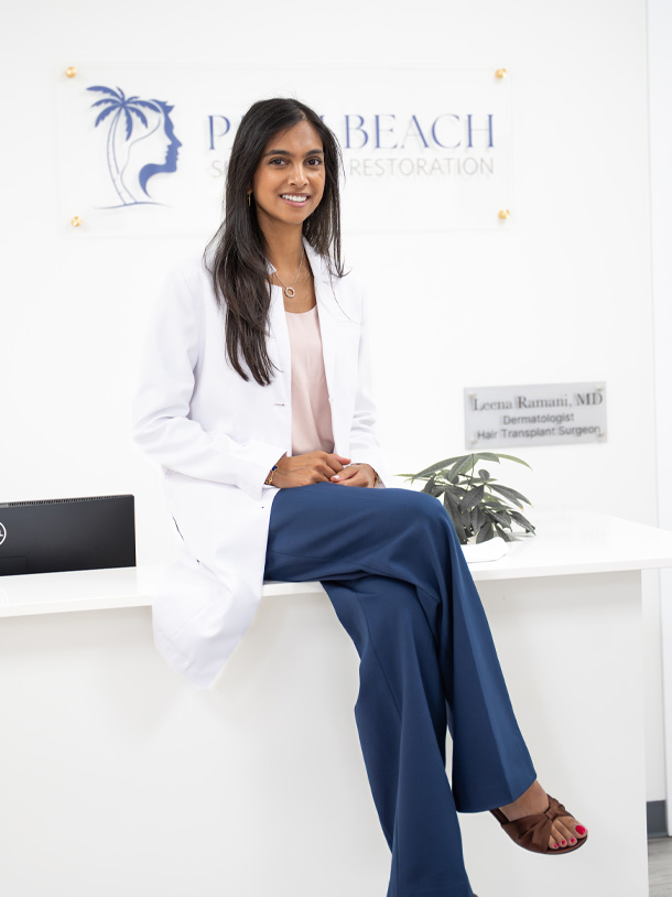 Dr. Leena Ramani at the front desk at Palm Beach Skin & Hair Restoration in Jupiter, FL