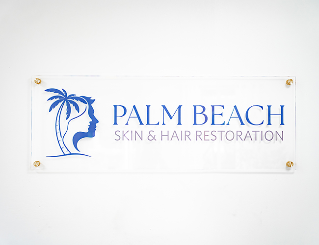 logo on wall at Palm Beach Skin & Hair Restoration in Jupiter, FL